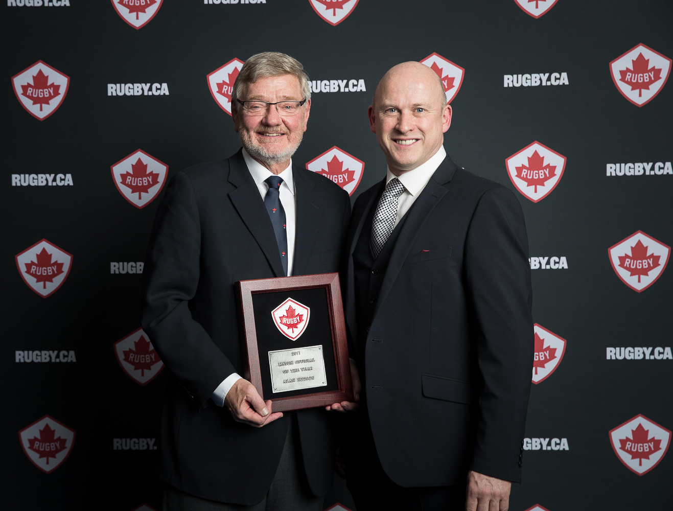 Alan Hudson wins Canadian Match Official of the Year Award. SAlan Hudson wins Canadian Match Official of the Year Award. Sponsored by SportLoMo